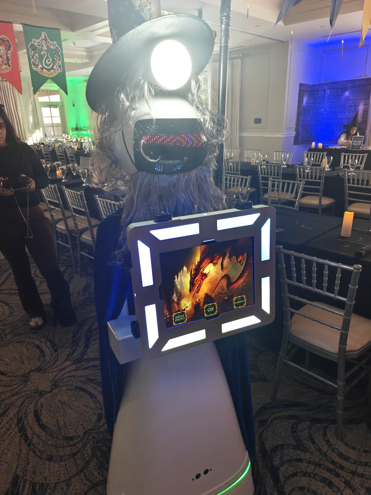 We Pose N' Snap robot dressed in a wizard costume at a Harry Potter themed party