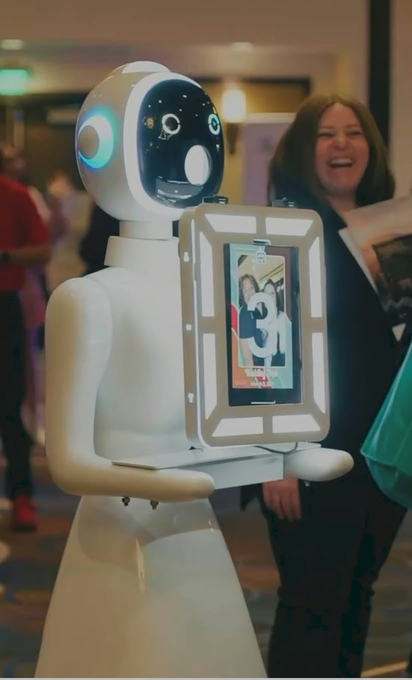 Robot photo booth roaming through a party