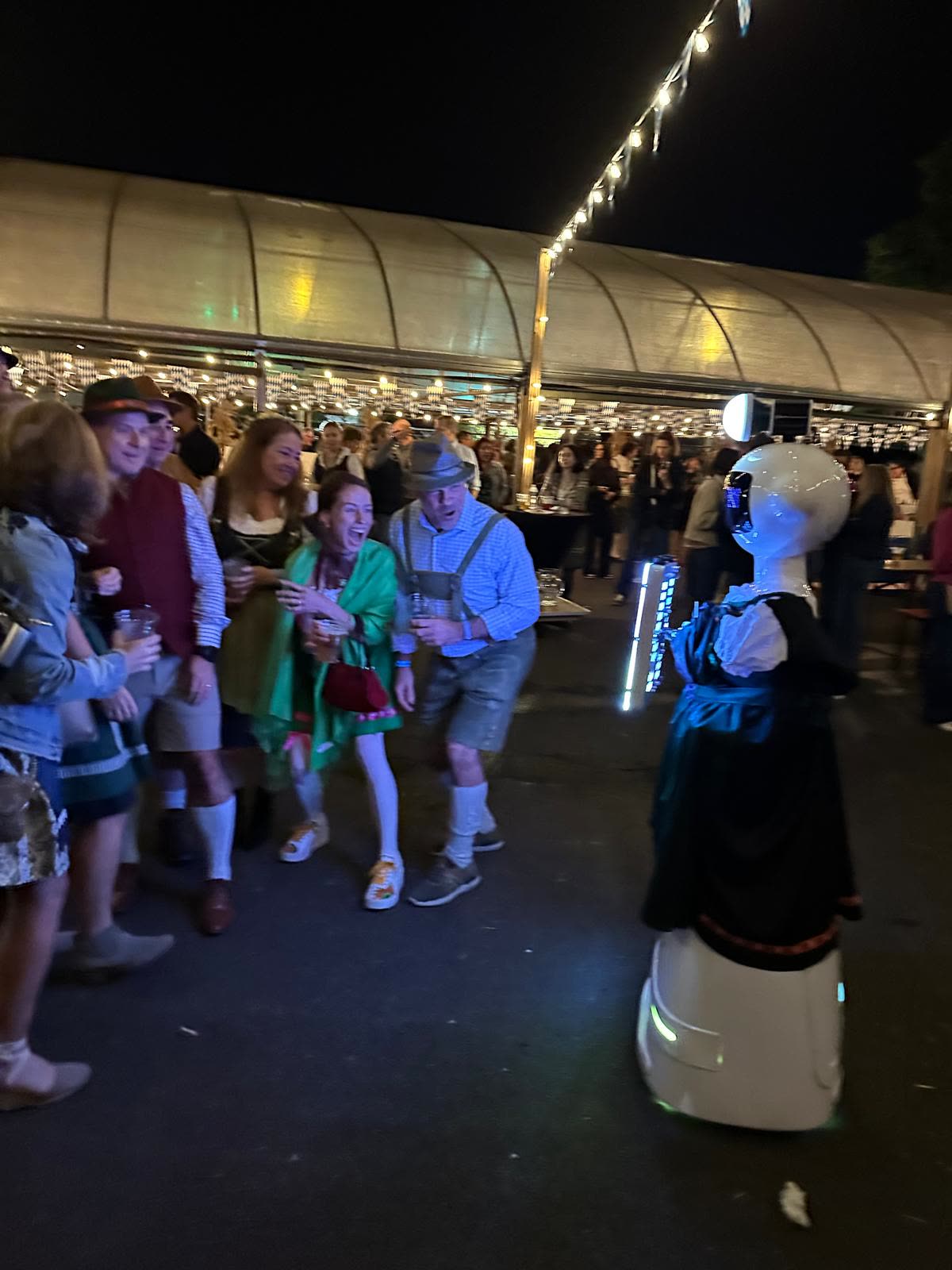 Guests having fun with the We Pose N' Snap robot photo booth
