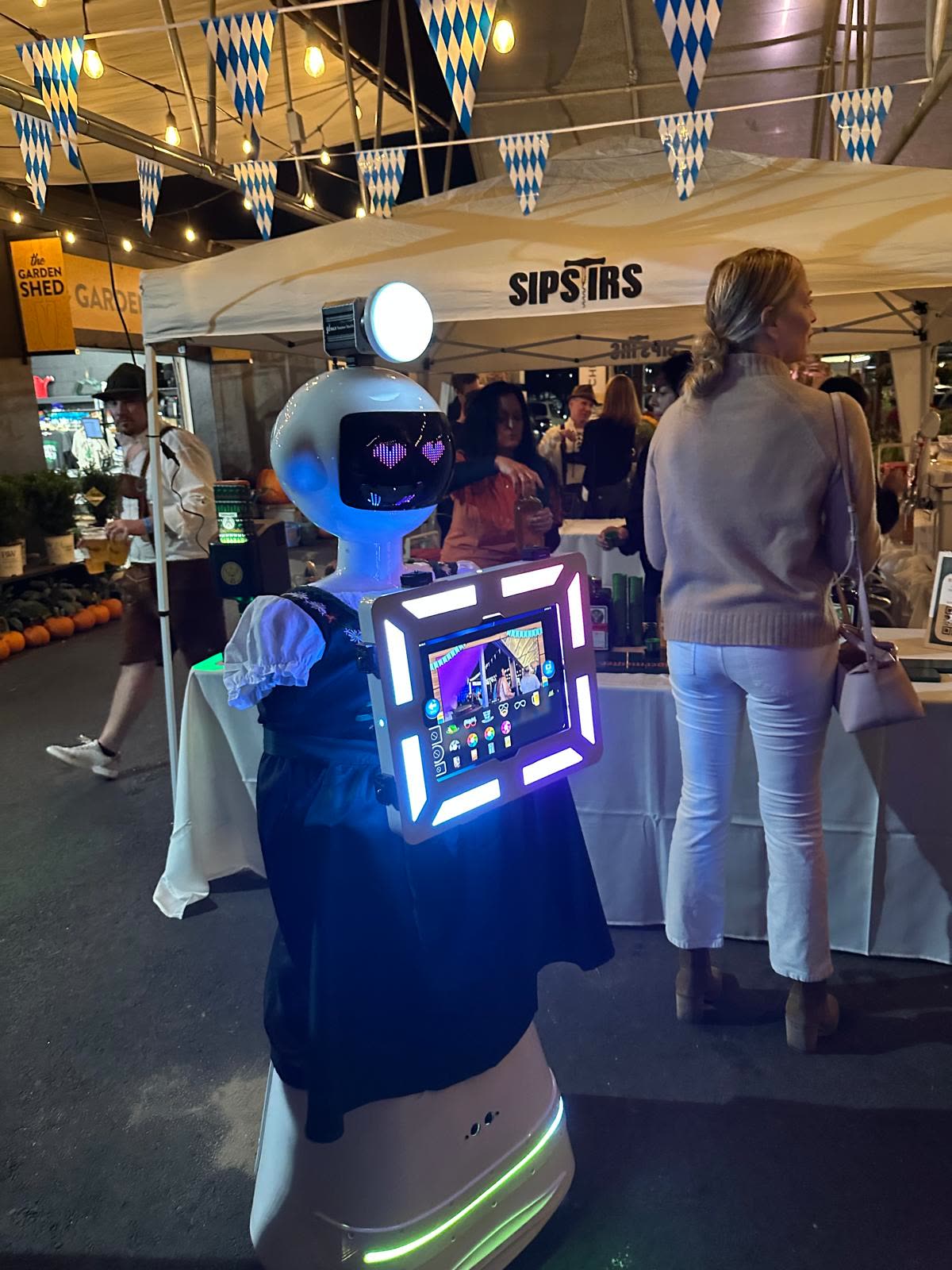 Guests having fun with the We Pose N' Snap robot photo booth
