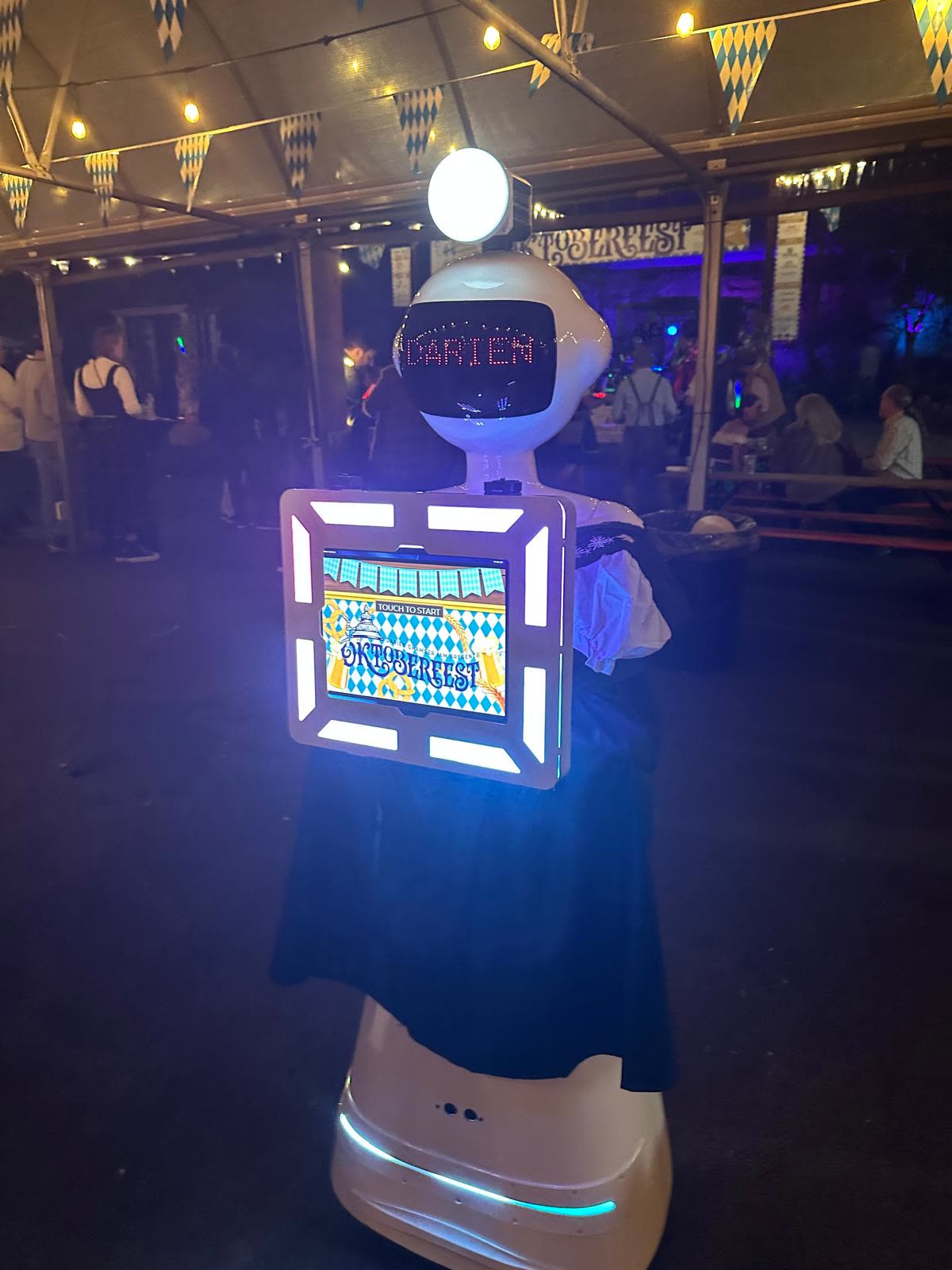 Guests having fun with the We Pose N' Snap robot photo booth