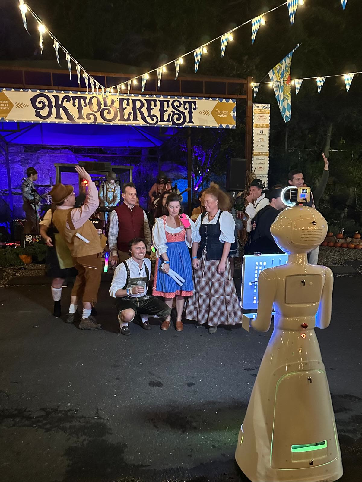 Guests having fun with the We Pose N' Snap robot photo booth