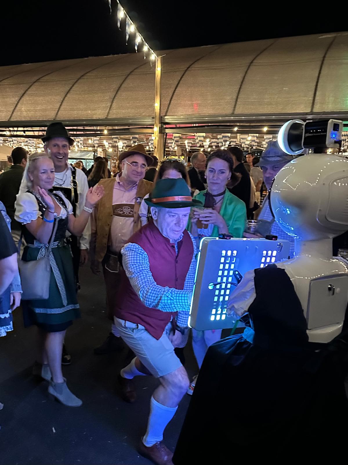 Guests having fun with the We Pose N' Snap robot photo booth